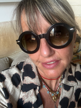 Lamusunglasses black chunky acetate round sunglasses with gradient lenses, worn by a woman with a leopard print shirt.