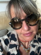 Lamusunglasses round frame sunglasses with tortoiseshell pattern acetate frames and gradient lenses.