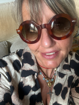 Lamusunglasses round frame sunglasses with tortoiseshell pattern acetate frames and gradient lenses.
